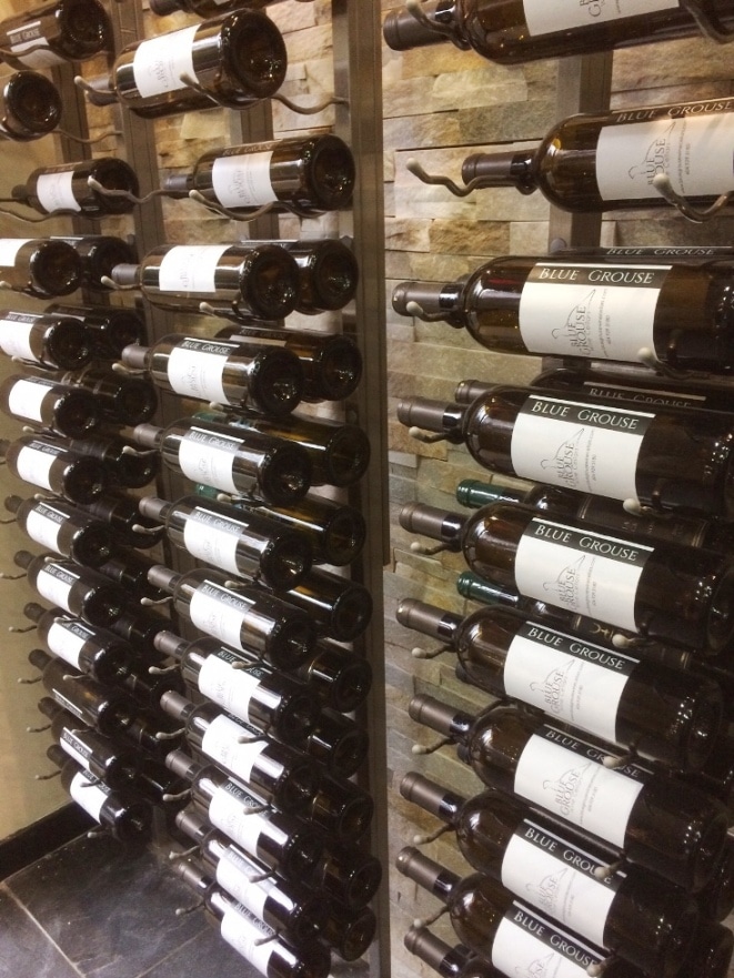 Bottles in VintageView Metal Wine Rack Designed by Miami Builders