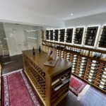 We incorporated different types of lighting to give more personality to this luxurious, custom-built Miami wine room.